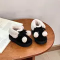 Gemütliche schwarze Kleinkinder-Schneestiefel mit weichem Plüschfutter und Pompons - Größe 23 (Innenlänge 14.5cm) / Schwarz