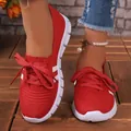 Stylish red knitted casual flats for women featuring a white sole and lace-up design - Red