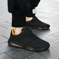 Breathable black mesh kids sneakers with bright yellow lining and velcro straps - 28 / Black & Gold