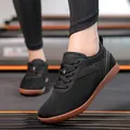 Chaussures de marche noires en maille tissée pour hommes et femmes avec semelle brune - 36 / Noir