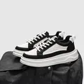 Classic black and white chunky sneakers featuring a thick sole and leather upper finish - 42 / Black and White