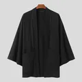 Full view detail of men's black batwing sleeve loose cardigan on a wooden hanger - S / Tops / Black