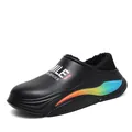 Close-up detail of black outdoor slip-on shoe with warm fur lining and rainbow sole - 36 / Black Cotton Slipper (JF795) / Black
