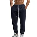 Detailed view of men's dark navy knit textured joggers with white drawstring waist - S / Bottoms / Navy Blue