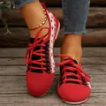 Stylish red lace-up knitted sneakers featuring white star patterns and flat soles for women - Red