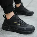 Vielseitige, komplett schwarze Outdoor-Wanderschuhe mit goldenem Wellenakzent für Herren - 39 / Schwarz