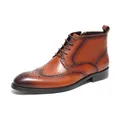 Classic brown leather brogue boots for men with side zipper and vintage carved details - Tan