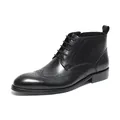 Men's classic black leather brogue boots with wingtip detailing and lace-up closure - Black