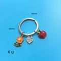 Joli porte-clés argenté avec cœur Thank You, fleur orange et pendentif pomme rouge - Sac OPP / Orange