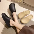 Wasserdichte Outdoor-Clogs mit weichem Kunstfellfutter für winterliche Wärme im Freien - Schwarz