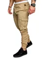 Close-up detail of khaki slim fit cargo pants for men with flap pockets and elastic cuffs - S / Bottoms / Khaki