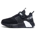 Breathable black mesh sports shoes for boys aged 6-12 featuring a durable soft rubber sole - Black and White