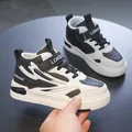 Baskets mi-hautes élégantes noir et blanc pour enfants avec finition cuir durable - 28 / Noir et Blanc