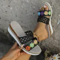 Bohemian platform wedge sandals with colorful floral embroidery and black woven straps. - Black Flower
