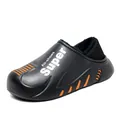 Close-up detail of black fleece-lined outdoor travel slippers with Super logo and orange accents - 38 / Black