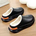 Waterproof black winter clogs with warm white fleece lining and stylish orange heel detail - Black