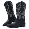 Detailed view of retro black men's cowboy boots featuring intricate white wing embroidery. - 7 / Black