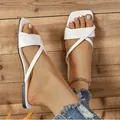 Elegant white flat crossover strap sandals with square toe design for summer fashion. - 35 / White