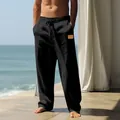 Close-up detail of men's loose black linen drawstring pants for breathable beach wear - S / Bottoms / Black