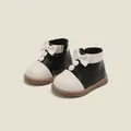Mädchen Prinzessinnen-Stiefel in Schwarz-Weiß mit weicher Sohle und süßer Schleife - Innenlänge 12.0cm / Schwarz