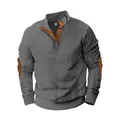Close-up detail of grey quilted men's sweatshirt with brown elbow patches and leather trim - S / Tops / Dark Gray