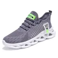 Boys' breathable grey mesh knit sneakers featuring a lightweight white blade sole - 31 / Gray