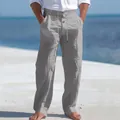 Dettaglio dei pantaloni in lino traspirante da uomo con coulisse e bottoni decorativi - Grigio