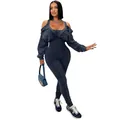 Detail view of a woman wearing a dark washed off-shoulder jumpsuit with ribbed texture. - S / Set / Black and Gray