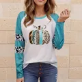 Women's long sleeve T-shirt with raglan sleeves and artistic pumpkin graphic print - S / Tops / Sky Blue