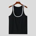 Vista de detalle de la camiseta de tirantes deportiva negra con ribetes blancos - Negro