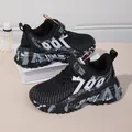 Breathable black mesh boys' sports running shoes featuring a graffiti 700 design - Black and White