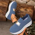 Blue knit platform sneakers for women with stylish silver metallic accents outdoors - 36 / Blue