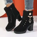 Close-up of elegant black winter ankle boots with knitted collar and pearl charm detail - 35 / Black