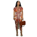 Fashionable woman wearing an African style orange ethnic print V-neck slim fit midi dress - S / Dresses / Orange