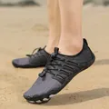 Breathable grey and black outdoor water shoes with quick-dry fabric on beach sand - 38 / Black