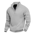 Dettaglio ravvicinato della felpa pesante in jacquard grigio con colletto a zip. - Grigio chiaro