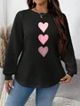 Detail of casual black sweatshirt with pink heart print and quilted square texture. - 3XL / Tops / Black Pink Heart