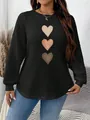Detailed view of women's black waffle knit sweatshirt featuring a three-color heart print - 3XL / Tops / Black Khaki Heart