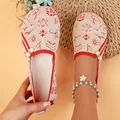 Detalle de zapatos planos de punto con motivos rojos de copos de nieve y renos - 36 / Rojo