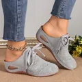 Detailed side view of gray hollow-out wedge mules featuring elegant lace-up design - 36 / Light Gray