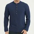 Close-up of a navy blue slim-fit men's Henley shirt featuring brown buttons detail. - S / Tops / Sapphire Blue