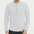 Close-up front detail of white slim-fit long-sleeved Henley shirt featuring wooden buttons - White