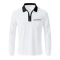 Detailed view of white long-sleeved polo shirt with black zipper and chest pocket - S / Tops / White and Black