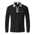 Front detail of men's black polo shirt showing grey zipper collar and chest pocket. - Black/Grey
