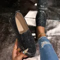 Detailed close-up showing the shiny black glitter texture of platform slip-on loafers - 35 / Black