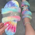 Close-up detail of colorful tie-dye faux fur slippers featuring a sparkling rhinestone strap - 36 / Colorful