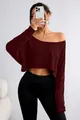 Mirror selfie view of a burgundy long-sleeved one-shoulder crop top with loose fit. - S / Tops / Burgundy