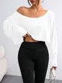 Detailed view of a white off-the-shoulder long sleeve crop top with a loose fashion fit - S / Tops / White
