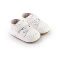 Close-up detail of white baby walking shoes with velcro straps and soft leather texture - Inner Length 11cm (2253) / White