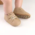 Detailed view of tan infant walking shoes showing non-slip sole and soft leather texture - 11cm / Dark Khaki